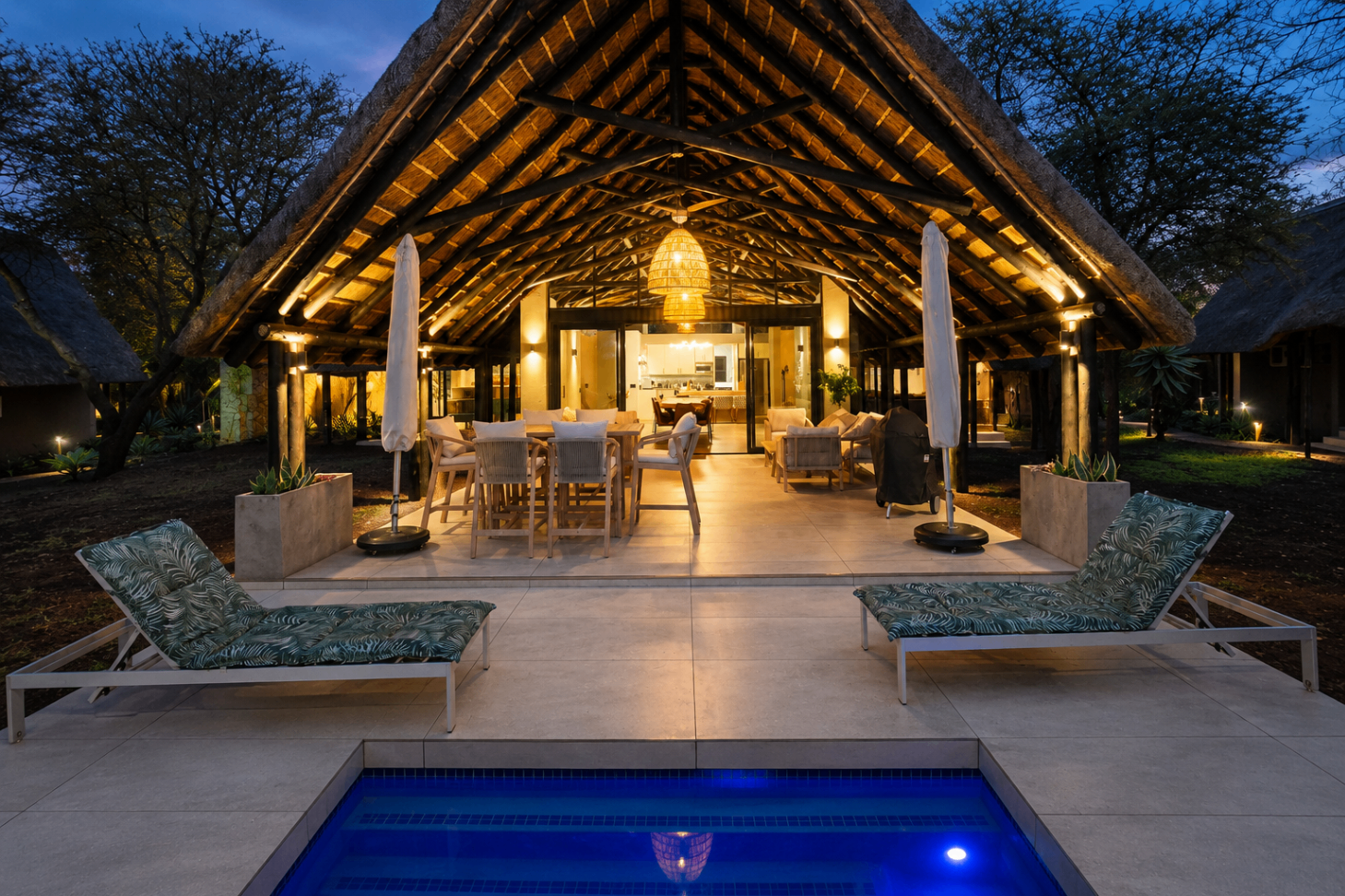 Close view of the front patio loungers and pool edge.