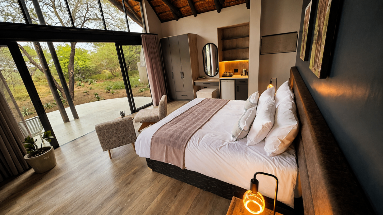 Bedroom looking out onto the bushveld at first light.