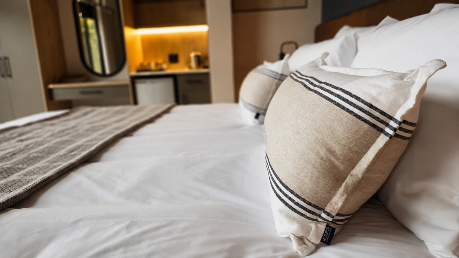 Bedroom detail - linens, textures and considered finishes.