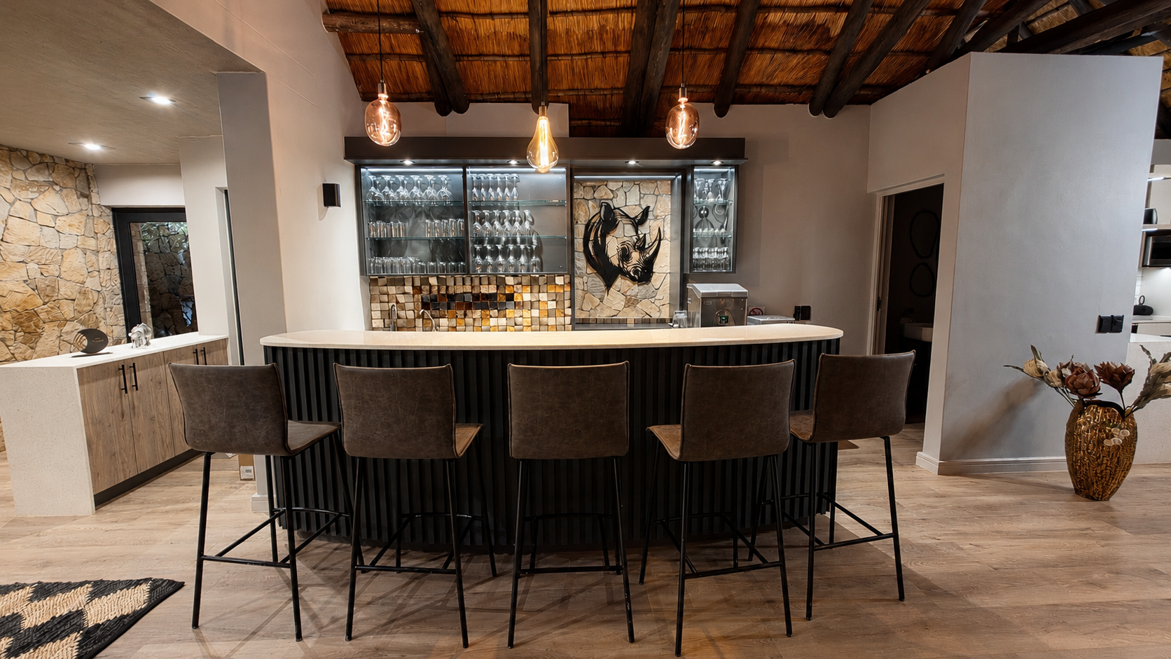 The intimate bar tucked alongside the lounge.