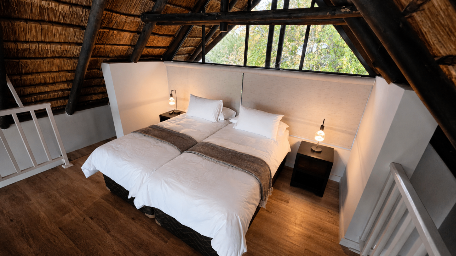 Mezzanine loft twin bedroom under the thatch.